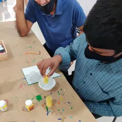 Cousins spending quality vacation time together at the studio, creating unique decor for their rooms.