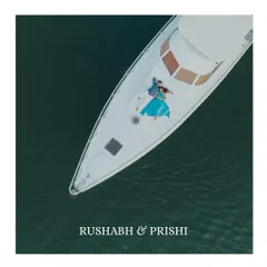 A breathtaking aerial view of a couple finding their own world on a luxury yacht in Goa. This drone shot captures the scale of the ocean and the intimacy of their moment together.