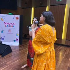We love performing for and with our students. Here we are on stage at the NMACC Bachpan festival, sharing the joy of Indian folk music.