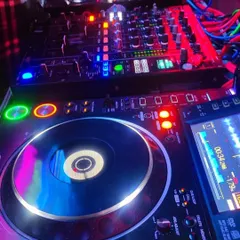 A close-up of my Pioneer mixer and deck. This is top-of-the-line equipment that ensures a professional sound and gives me full creative control over the music.
