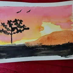 A simple yet beautiful sunset landscape created by a student, showcasing the lovely color washes typical of watercolor.