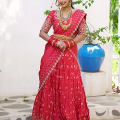 A full view of a vibrant red lehenga drape, perfect for sangeets or receptions. I can create various creative drapes that blend traditional elegance with a modern flair.