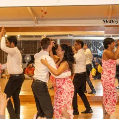 A student team performance at our Motley Mixer. Our performance bootcamps guide students from learning choreography to performing it with confidence in front of an audience.