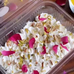 For festive occasions like Holi, I create special fusion desserts like this Thandai Tres Leches. It's a creamy, milk-soaked cake infused with traditional thandai spices and garnished with rose petals, pistachios, and almonds for a truly unique treat.