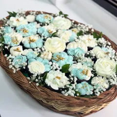 Is it a bouquet or a dessert? This is one of my favorite creations, a cupcake basket where every single flower is hand-piped with buttercream. It’s a perfect example of how I turn a simple treat into a piece of edible art, ideal for gifting.