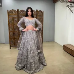 This grey embroidered lehenga is perfect for a reception or engagement, offering a unique and elegant look.