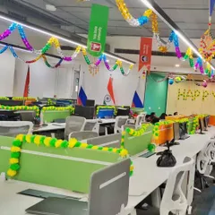 The festive spirit should be everywhere. I decorated the entire workstation area with colorful streamers and flower garlands to keep the office vibe cheerful.
