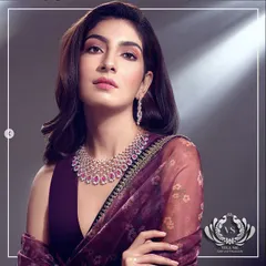 A campaign for Vega Sri Gold and Diamonds where the jewelry is the star. I paired a stunning diamond and ruby necklace with a simple, elegant saree in a matching color palette to ensure the focus remains on the exquisite craftsmanship.