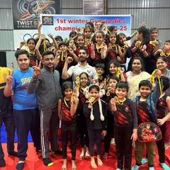 The entire team celebrating their success at the 1st Winter Gymnastics Championship. We win as a team.