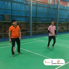 Two colleagues enjoying a casual game during their corporate event. Our facilities cater to all skill levels, ensuring everyone can participate and have a good time.