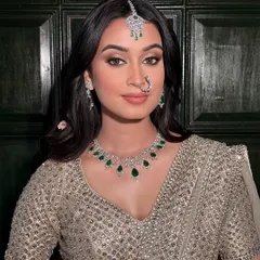 A portrait of bridal grace. Here, the makeup is designed to look stunning from every angle, with softly contoured features and eyes that captivate, making her feel confident and beautiful.
