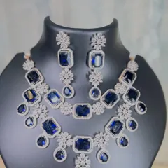 A full view of the layered sapphire blue stone necklace set. Renting this piece gives you a celebrity-inspired look, perfect for making an entrance at a cocktail party or reception.