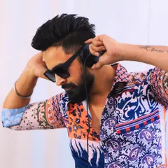 Getting into the zone with my headphones. This shot is all about my connection to the music before I even hit the stage.