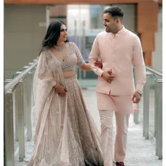 A candid shot of the newly engaged couple walking and sharing a laugh. Capturing these unposed, happy moments is key to telling the real story of your celebration.