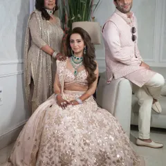 A beautiful family portrait from the Advani-Jain Mehandi. My client is seated, showcasing the full glory of her custom-styled pastel lehenga.