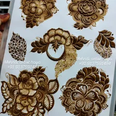 A practice sheet filled with various floral motifs and leafy fillers. These are the building blocks I use to create my unique and intricate designs.