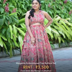 This magenta embroidered top and bottom set is a fun, vibrant, and comfortable choice for a Mehendi party.