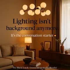 Lighting is no longer just a utility; it's a conversation starter. This image highlights the trend of using statement lighting fixtures to add drama and personality to a room.