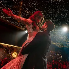 Alya and Shivaan soar during their first dance, under a sky of starry lights. This romantic and dynamic shot captures the magic of the moment.
