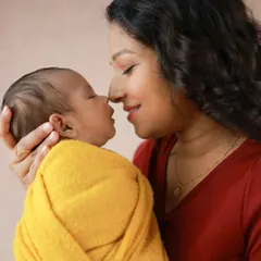 A mother and her baby, nose to nose. This simple, intimate pose is one of my favorites for showing the deep, unspoken connection and love.