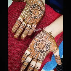 A traditional mandala design for the groom, with his bride's name "Sakshi" beautifully written within it.