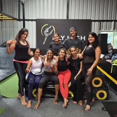 The full team of strong women, including me. It's a privilege to coach such a dedicated and inspiring group of adults.