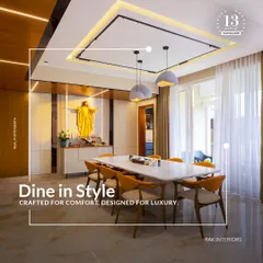 Dine in style with this luxurious setup. The design features a prayer niche seamlessly integrated into the dining area, combining functionality with spiritual elegance. The orange chairs add a vibrant pop of color.