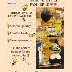 Celebrating the journey to motherhood with our 'Mom-to-Be' hamper. This bee-themed, multi-layered gift is filled with self-care goodies, comfort treats, and sweet mementos to pamper the expecting mother. It’s a perfect baby shower gift.