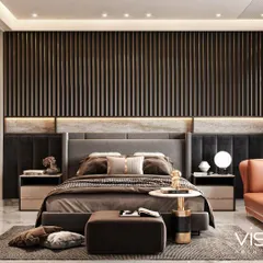 A luxurious master bedroom render featuring a dark fluted wood panel behind the bed, contrasted with a marble floor and a pop of color from the orange sofa. This CGI helps in balancing dark tones with warm accents.