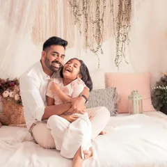 Another beautiful moment of laughter and love between this father and daughter. These unposed, natural interactions create the most authentic and heartwarming family portraits.