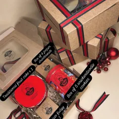 The Ultimate Christmas Hamper is the perfect Secret Santa gift or treat for your loved ones. It's packed with a traditional fruit cake, snickerdoodle cookies, jimjam shortbreads, and a double chocolate fudgy brownie.