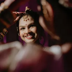 The pure, unscripted joy of a bride on her special day. This candid bridal portrait is what I love to capture. It’s that beautiful, in-between moment, full of happiness and anticipation, that tells a truer story than any posed photograph.