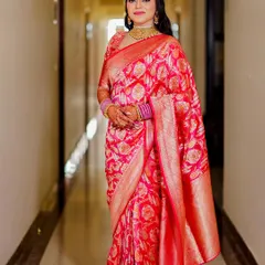 This bride wore a beautiful pink silk saree for her wedding. The makeup was kept soft and elegant to match the humidity of July, and it stayed flawless.