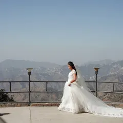 This is what we mean by making the landscape part of the story. We'll show you how to use composition and perspective to frame your subject against a vast mountain range, creating a sense of scale and grandeur that elevates a simple bridal portrait into an epic memory.