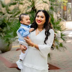 The beautiful bond between a mother and her son. This candid shot captures a moment of pure happiness and connection, showcasing the natural smiles we strive to photograph.