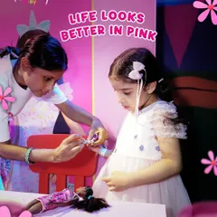Life looks better in pink at our Barbie's Dream Day event! Here, one of my Play Pals helps a little guest with a fun Barbie-themed craft, part of a day filled with sparkle and creativity.