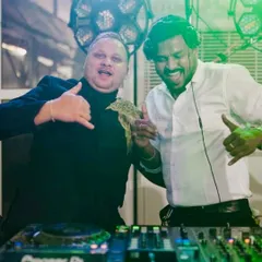 Sharing a laugh and good vibes behind the decks with actor Daali Dhananjaya. My events often attract well-known personalities, adding to the exciting atmosphere of the night.