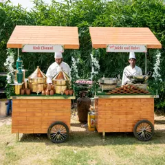 A pair of my live food carts featuring classic Indian comfort food. One station serves hot Kadhi Chawal while the other prepares fresh Jalebi and Rabri, bringing a traditional and homely feel to any celebration.
