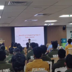 A view from the back of a wellness talk at Volvo. My sessions often begin with an educational component to explain the 'why' behind the practices we are about to do.