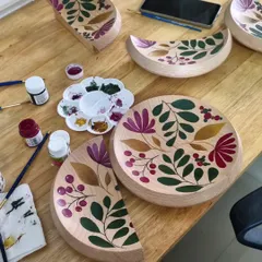 The finished hand-painted wooden handles, ready to be installed. Each one is a small piece of art, showcasing our commitment to artisanal detailing.