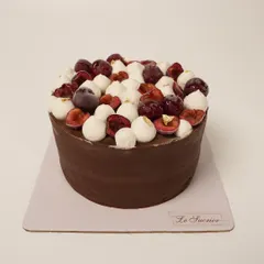My take on the classic Black Forest Cake. I use moist chocolate sponge, an in-house fresh cherry compote, and layers of both vanilla mascarpone and dark chocolate mousse.
