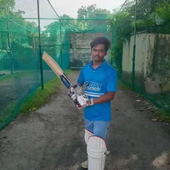 A young batsman posing with his new bat. The right gear can make a big difference to a player's confidence and performance.