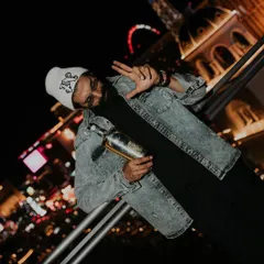 A more playful shot from the Loca Loka campaign in Vegas. Rana Daggubati's relaxed pose and peace sign bring a fun energy, showing the versatility of the styled look.