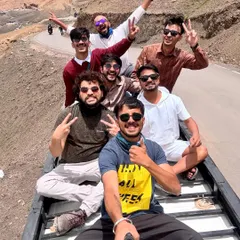 Sometimes the best views are from the roof of our Tempo Traveller. This is what my Himalayan road trips are all about: good music, great company, and making memories on the open road. This selfie captures the pure joy of a Spiti adventure.