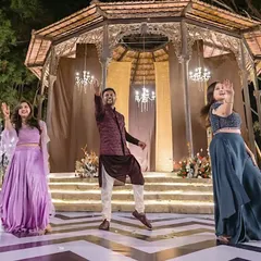 We planned this surprise for the bride where the groom jumped into the middle of a dance performance. It's a fun, high-energy way to kick off the sangeet celebrations.