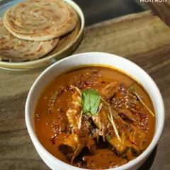 Our Ek Taar Ki Nalli Nihari is a Ramzan special that is pure indulgence. The lamb shank is slow-cooked for hours until it's incredibly tender, resulting in a rich, aromatic gravy best mopped up with a flaky Moti Roti.
