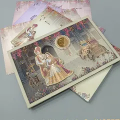 This invitation features a lovely illustration of a royal couple in a palace setting. The card has a premium, glossy finish and comes with matching inserts.