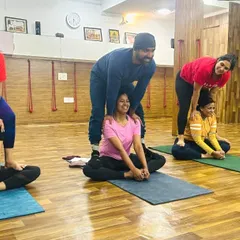 Partner stretches, like this assisted butterfly pose, allow for a deeper release and opening. It's a beautiful way to connect and help each other progress.