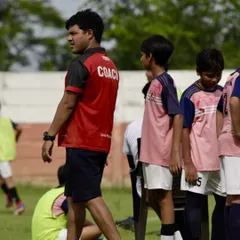 A coach observing the game from the sidelines during our Intra-Academy Championship. Our coaches are always analyzing, guiding, and mentoring our players.