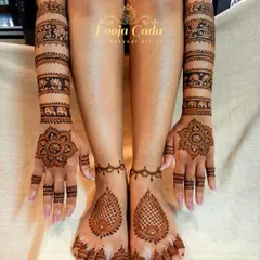A complete bridal look, showing how hand and feet designs can be coordinated. The feet feature a simple yet elegant paisley design with a delicate ankle band, perfectly matching the unique banded arm design.